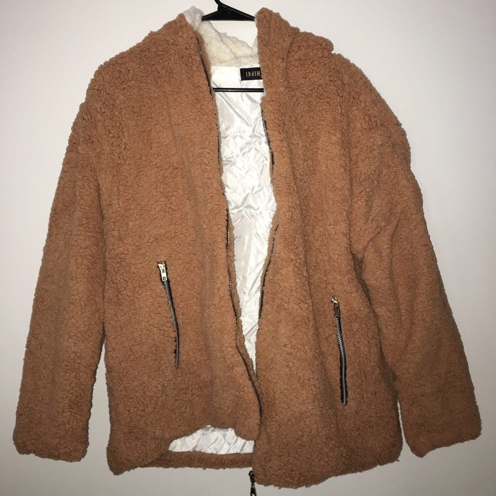 Fuzzy tan jacket with white lining